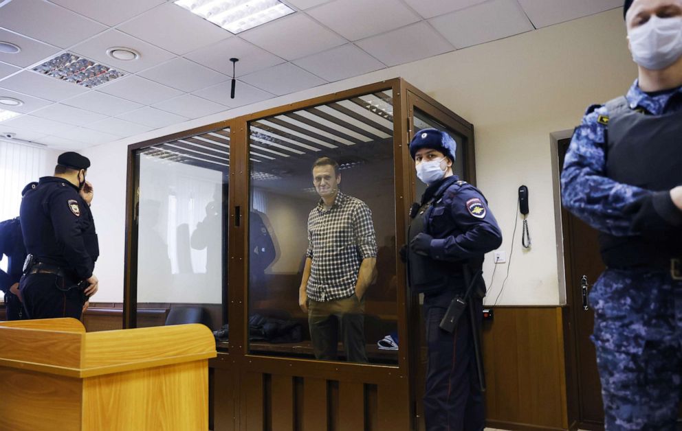 FILE PHOTO: Russian opposition leader Alexei Navalny attends a hearing to consider an appeal against an earlier court decision to change his suspended sentence to a real prison term, in Moscow, Russia February 20, 2021. 