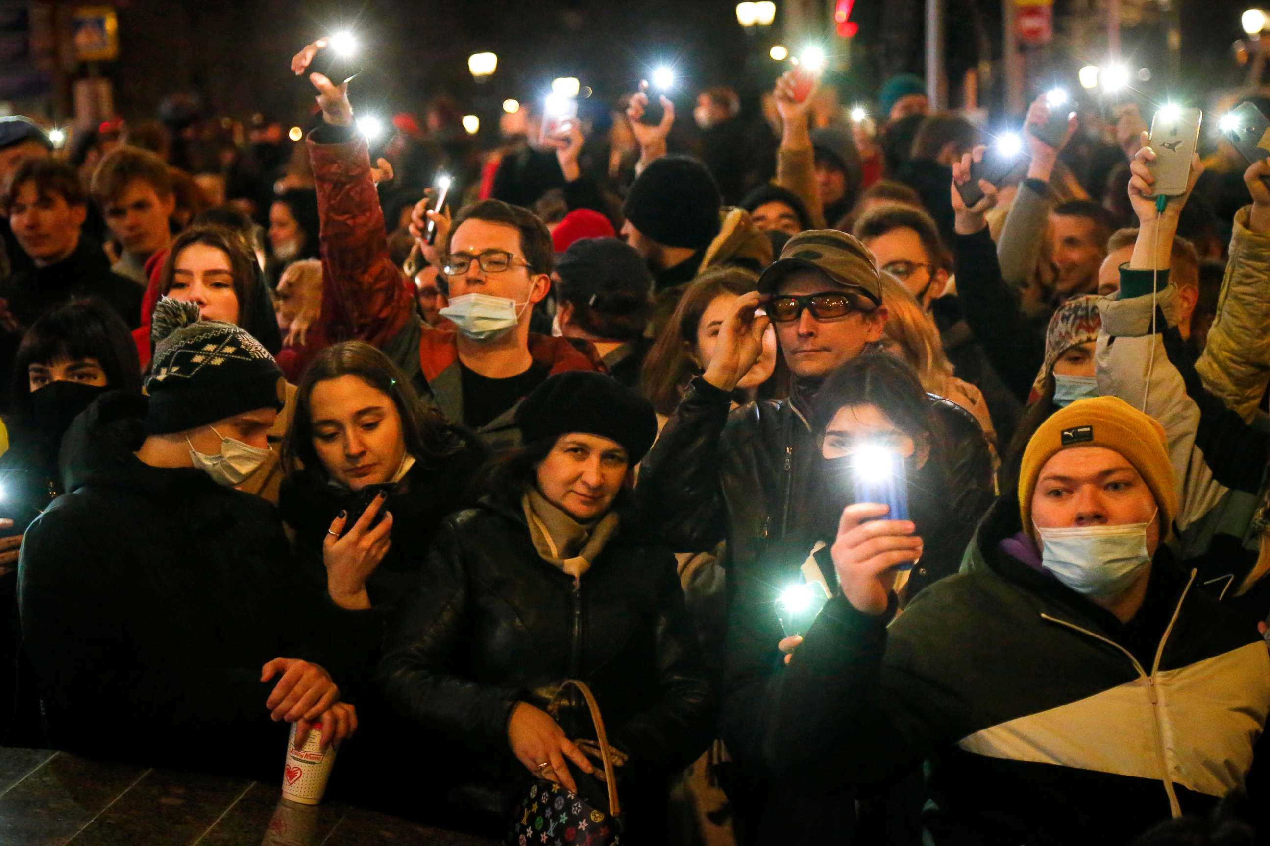 PHOTO: People shine the lights of their mobile phones during the opposition rally in support of jailed opposition leader Alexei Navalny in Moscow, Russia, April 21, 2021.