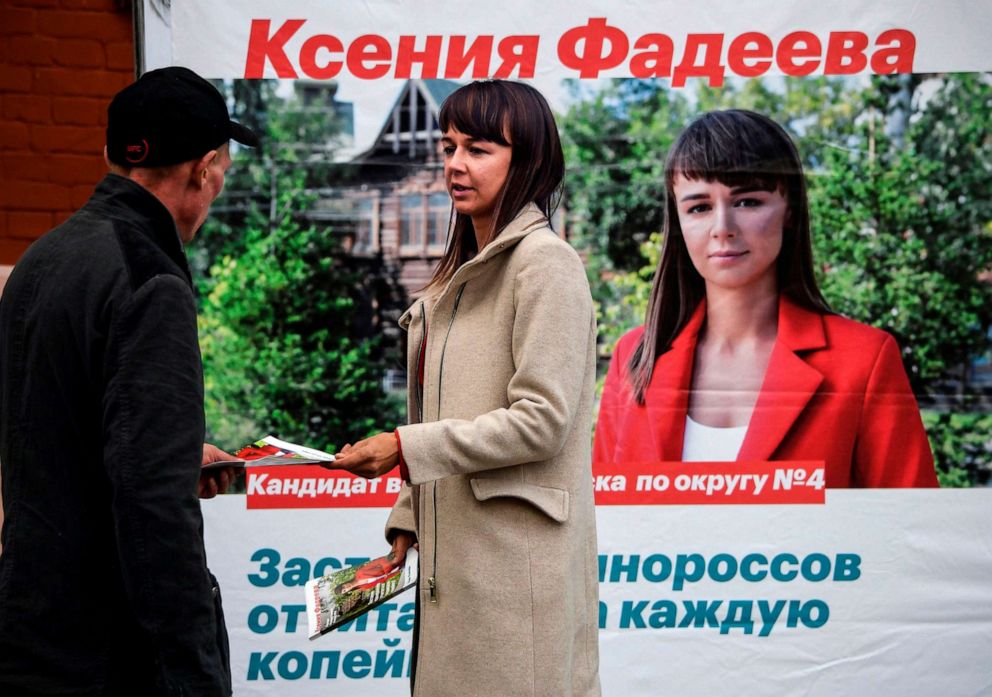 PHOTO: Ksenia Fadeyeva, 28, the head of Alexei Navalny's Tomsk headquarters and the city council candidate in Sept. 13 regional elections, distributes campaign leaflets in the Siberian city of Tomsk on Sept. 7, 2020.