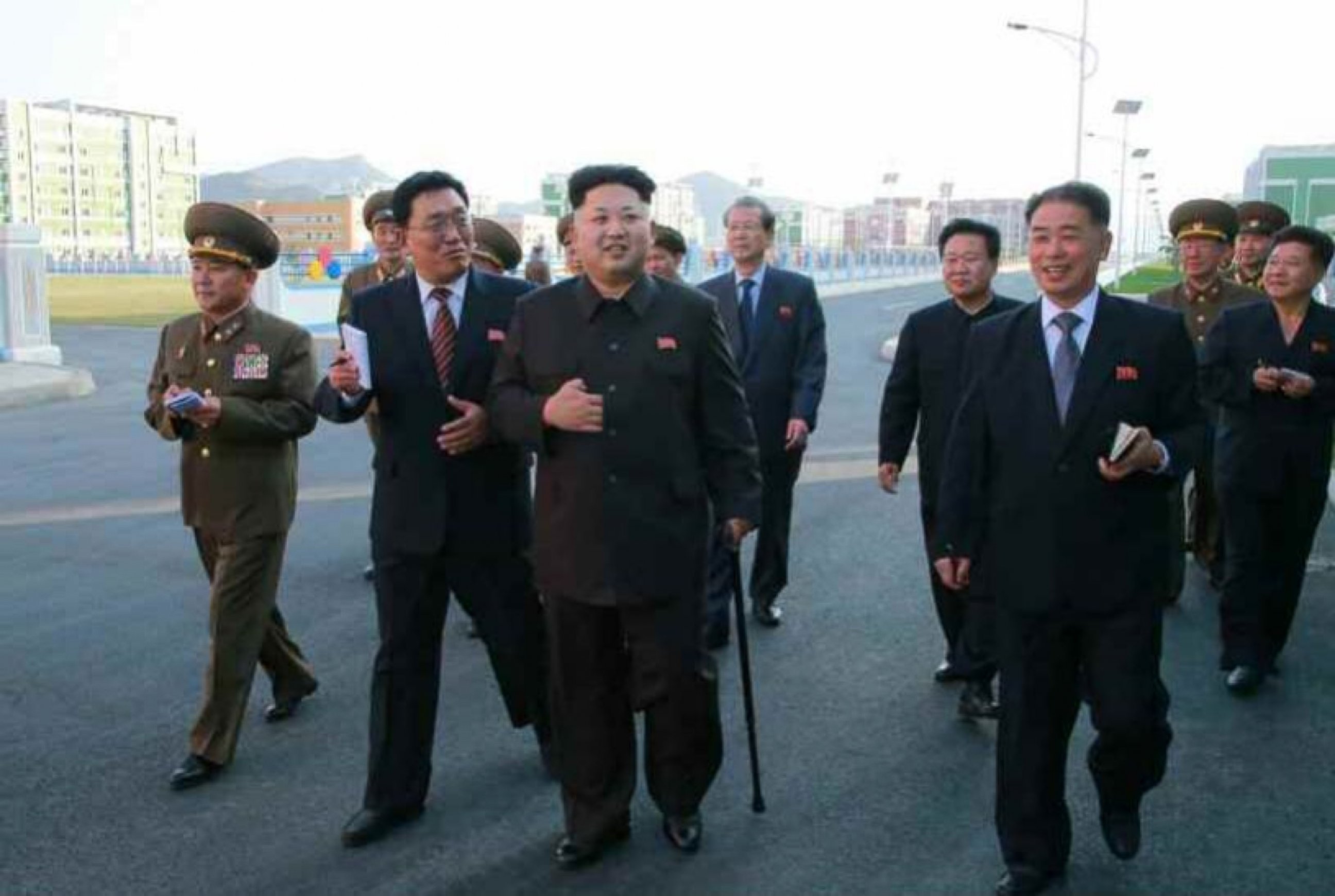 PHOTO: A photo released by North Korea's official news agency on Oct 14, 2014 shows North Korean leader Kim Jong-un using a cane during his first public appearance in weeks.