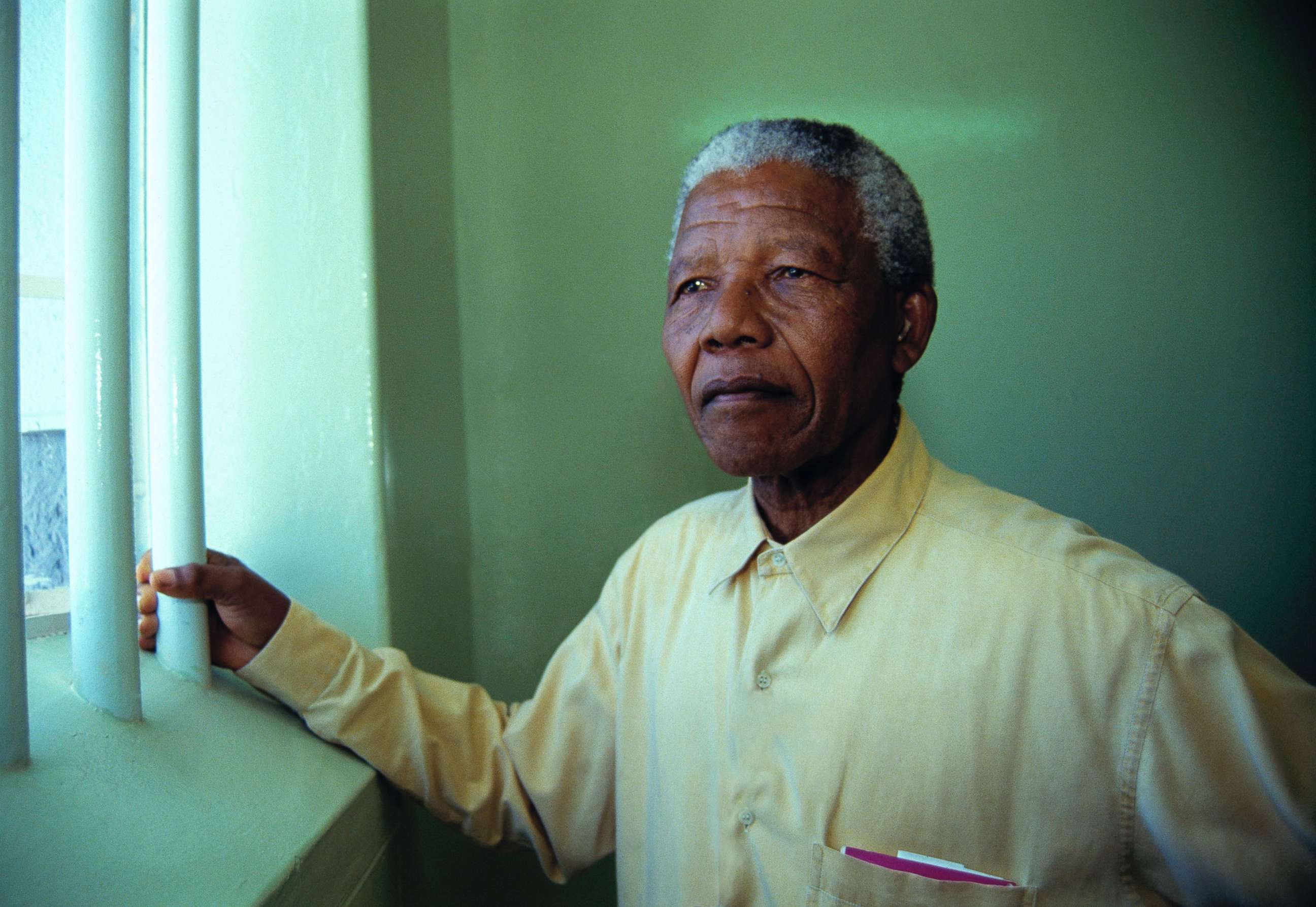PHOTO: Nelson Mandela revisits the cell at Robben Island Prison, Feb. 11, 1994, where he was jailed for more than two decades. 