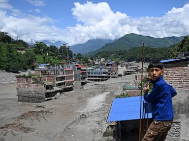 Hundreds dead as nearly 1,000 remain missing in massive Nepal-Tibet flood