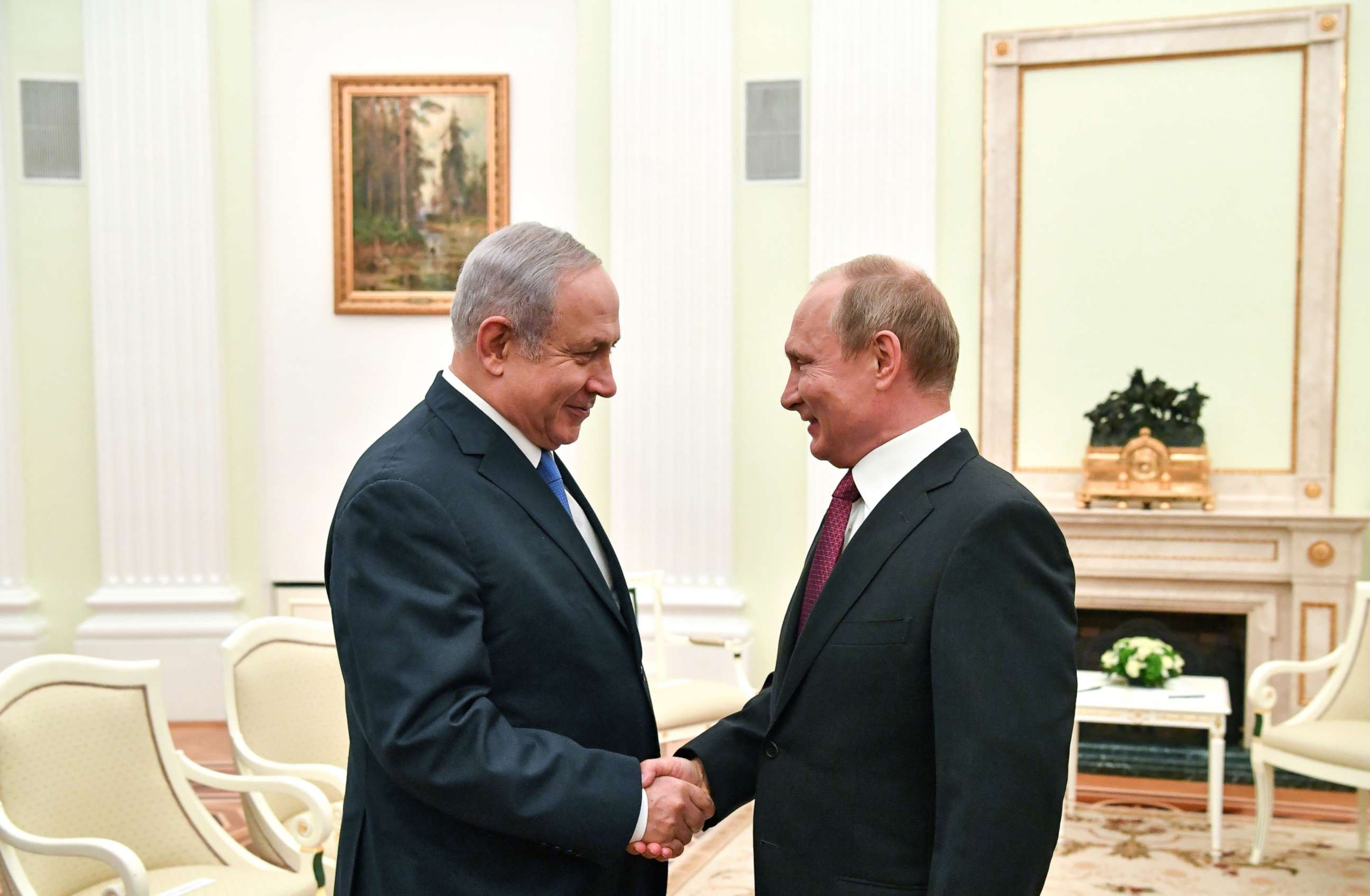 PHOTO: Russian President Vladimir Putin, right, shakes hands with Israeli Prime Minister Benjamin Netanyahu during their meeting at the Kremlin in Moscow on July 11, 2018.