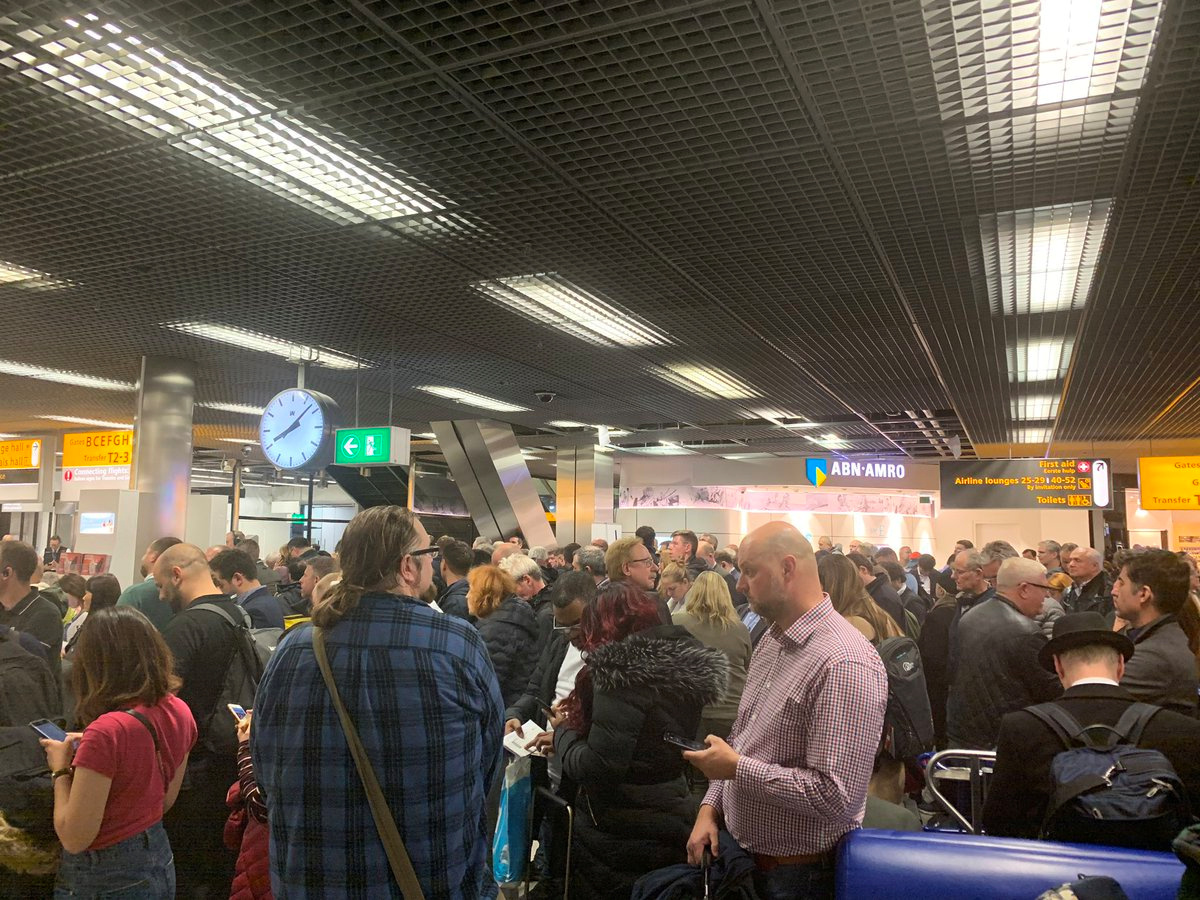 PHOTO: Passengers stand inside Amsterdam's Schiphol Airport during a security alert, Netherlands, Nov. 6, 2019, in this picture obtained from social media.