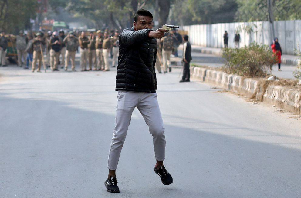 PHOTO: An unidentified man brandishes a gun during a protest against a new citizenship law outside the Jamia Millia Islamia university in New Delhi, Jan. 30, 2020.
