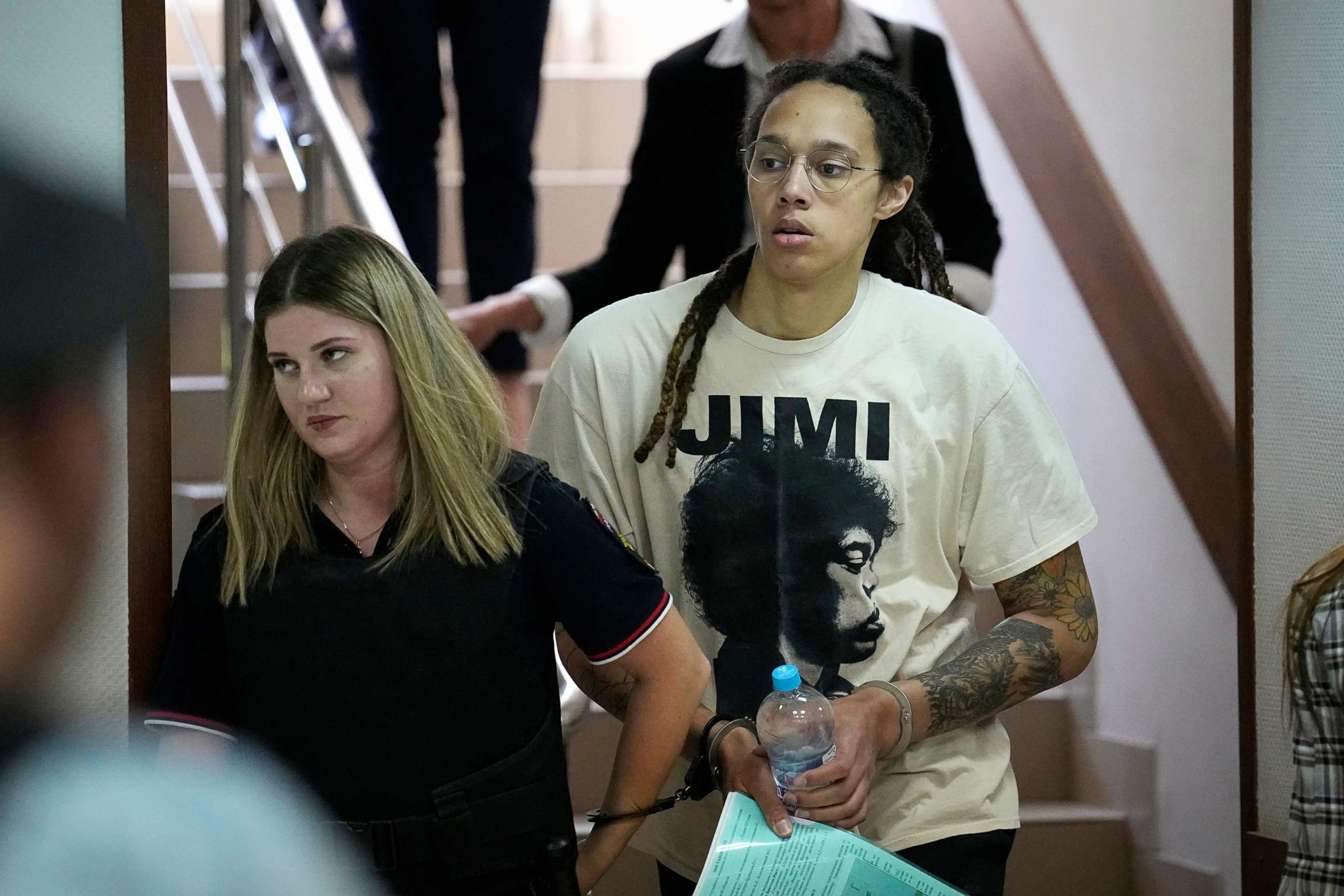 PHOTO: WNBA star and two-time Olympic gold medalist Brittney Griner is escorted to a courtroom for a hearing, in Khimki just outside Moscow, July 1, 2022.