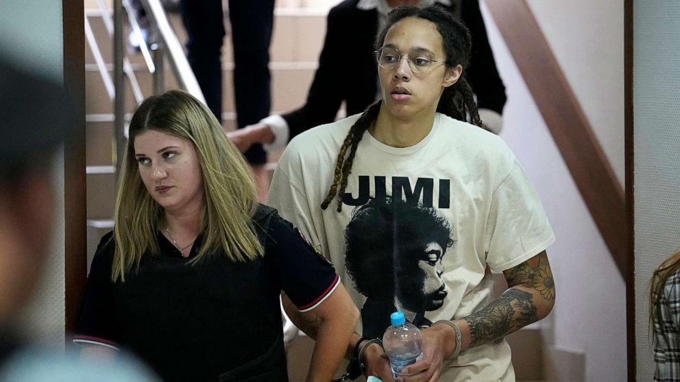 PHOTO: WNBA star and two-time Olympic gold medalist Brittney Griner is escorted to a courtroom for a hearing, in Khimki just outside Moscow, July 1, 2022.