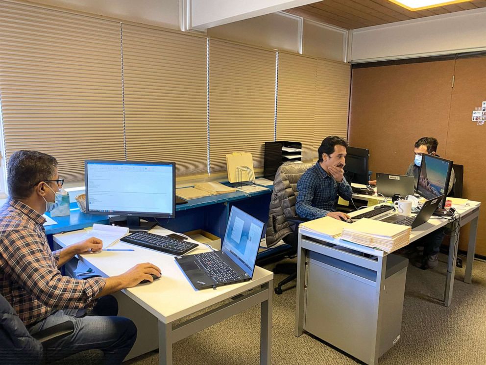 PHOTO: Afghan refugees work inside Lutheran Immigration and Refugee Service's (LIRS) newly-launched resettlement office in Alexandria, Va., Dec. 16, 2021.