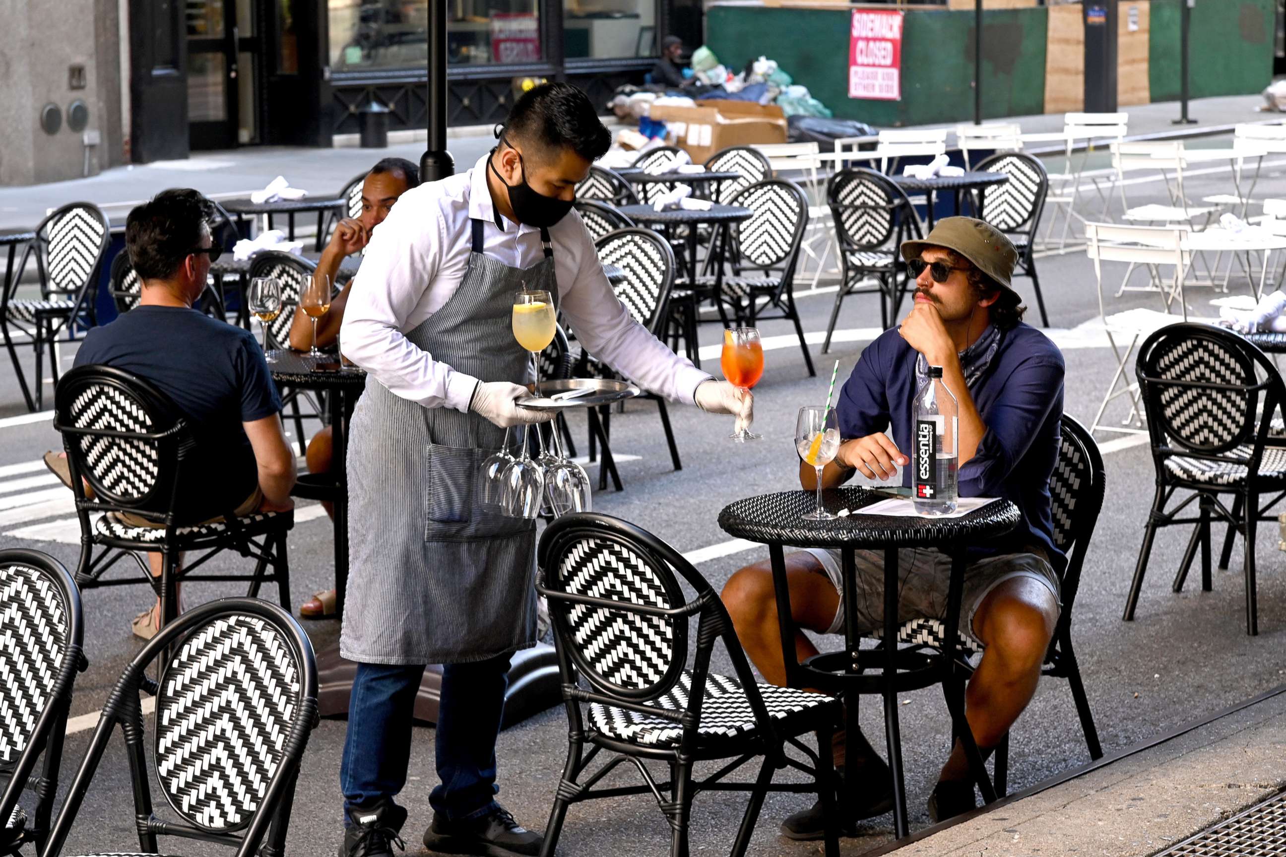 PHOTO: An outdoor dining area is seen as the city continues Phase 4 of re-opening following restrictions imposed to slow the spread of coronavirus on July 27, 2020 in New York City.