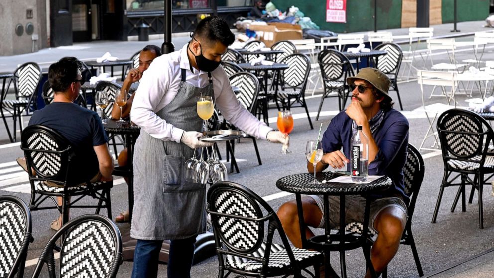 PHOTO: An outdoor dining area is seen as the city continues Phase 4 of re-opening following restrictions imposed to slow the spread of coronavirus on July 27, 2020 in New York City.