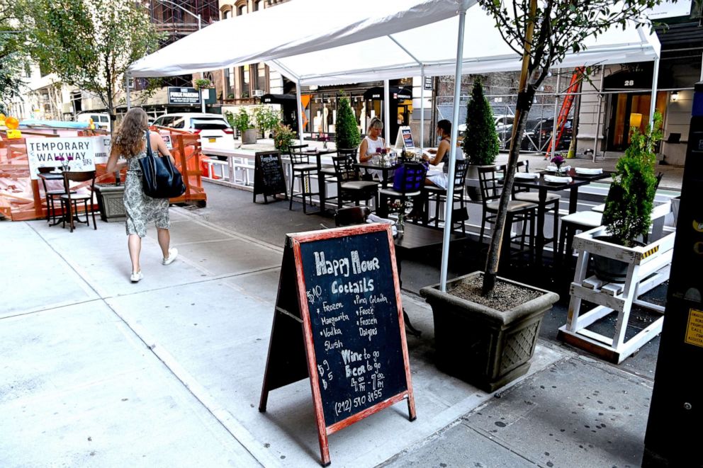 PHOTO: An outdoor dining area is seen as the city continues Phase 4 of re-opening following restrictions imposed to slow the spread of coronavirus, July 27, 2020, in New York City.
