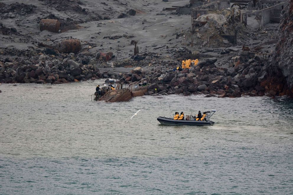 PHOTO: Soldiers work to recover bodies from White Island after a volcanic eruption in Whakatane, New Zealand, Dec. 13, 2019. A team of eight New Zealand military specialists landed on White Island early Friday to retrieve the bodies.