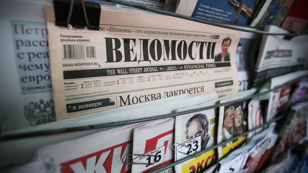 PHOTO: A copy of the Vedomosti daily newspaper sits for sale at a street vendor's stall in Moscow, Russia, Sept. 25, 2014.