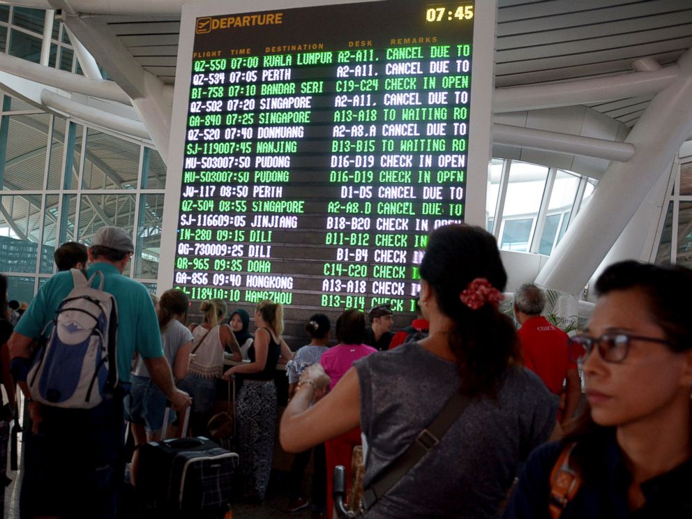 PHOTO: A flight information board shows cancelled flights at Ngurah Rai International Airport in Bali, Indonesia, Nov. 27, 2017.