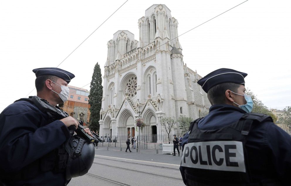 PHOTO: Police officers stand guard near Notre Dame church in Nice, southern France, Oct. 29, 2020.