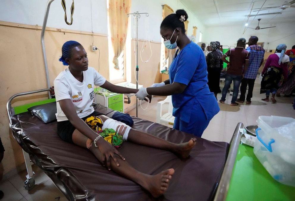 PHOTO: A victim of an attack at St. Francis Catholic Church receives treatment at St. Louis Catholic Hospital in Owo, Nigeria, June 6, 2022.
