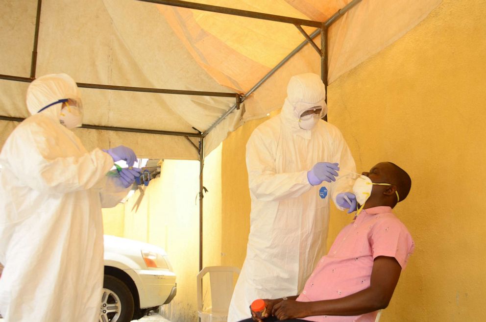 Health workers wait to takes a swab from a man during a community COVID-19 coronavirus testing campaign in Lagos, Nigeria, April 18, 2020.Olukayode Jaiyeola/NurPhoto via ZUMA Press via Newscom