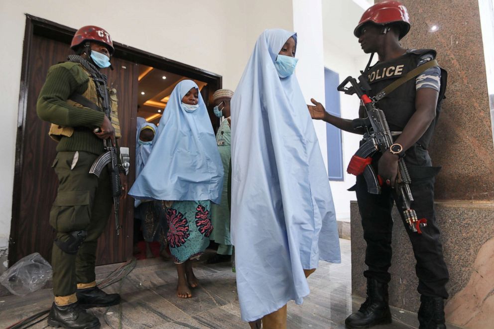 PHOTO: Girls who were kidnapped from a boarding school in the northwest Nigerian state of Zamfara, head for a medical check-up after their release in Zamfara, Nigeria, March 2, 2021.