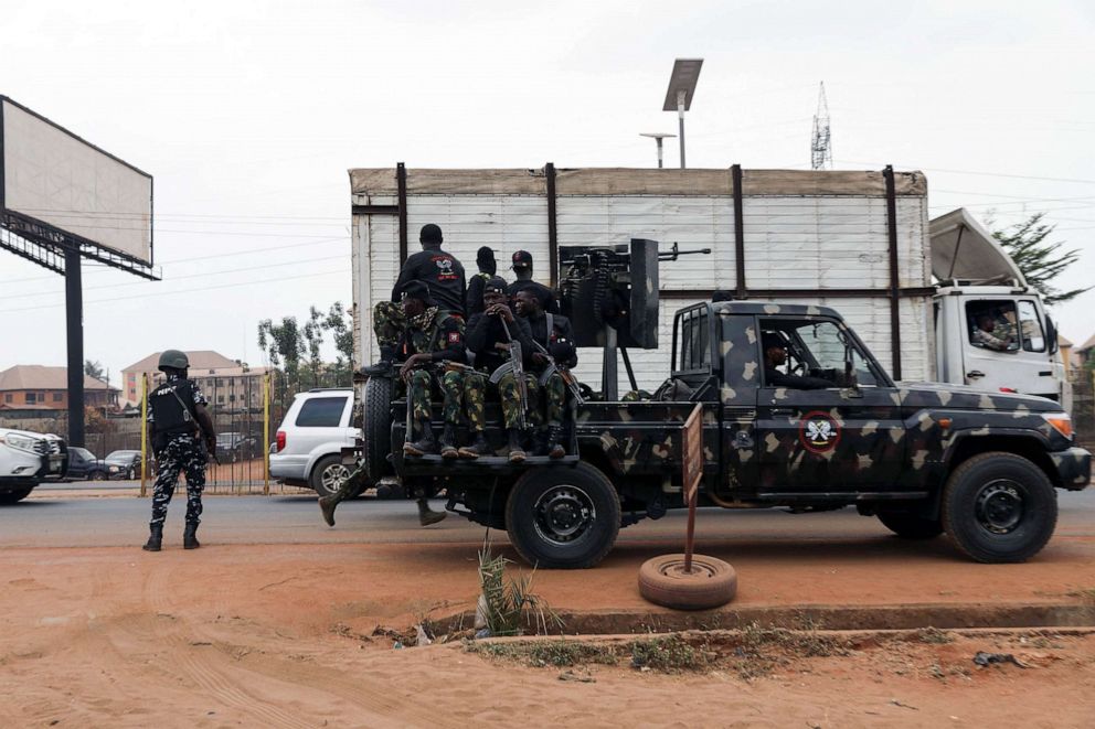 PHOTO: Armed Nigerian army officers are pictured outside the Central Bank of Nigeria (CBN) in Awka, Anambra state, southeastern Nigeria, on Feb. 24, 2023, ahead of the country's presidential election.