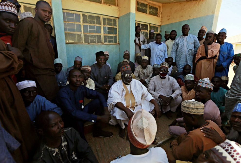 PHOTO: Parents gather during a meeting at the Government Science school after gunmen abducted students from it, in Kankara, in northwestern Katsina state, Nigeria on Dec. 13, 2020.