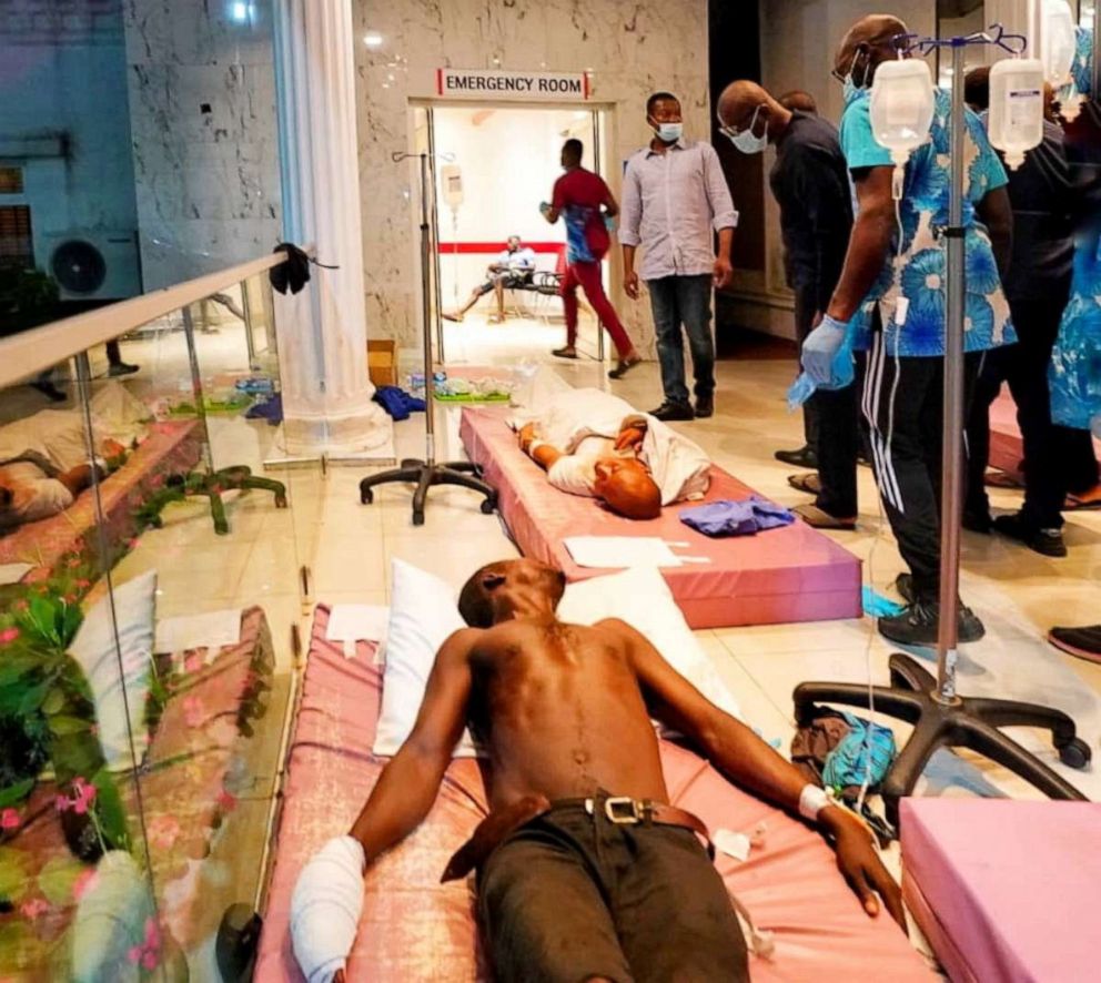 PHOTO: Lagos State Goveror Babajide Sanwo-Olu visits injured people at a hospital in Lagos, in this handout picture obtained by Reuters on Oct. 21, 2020, in Nigeria.