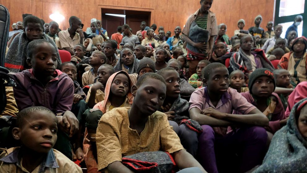 PHOTO: Released students sit together at the Government House with other students from the Government Science Secondary school, in Kankara, Katsina State, Nigeria, Dec. 18, 2020.