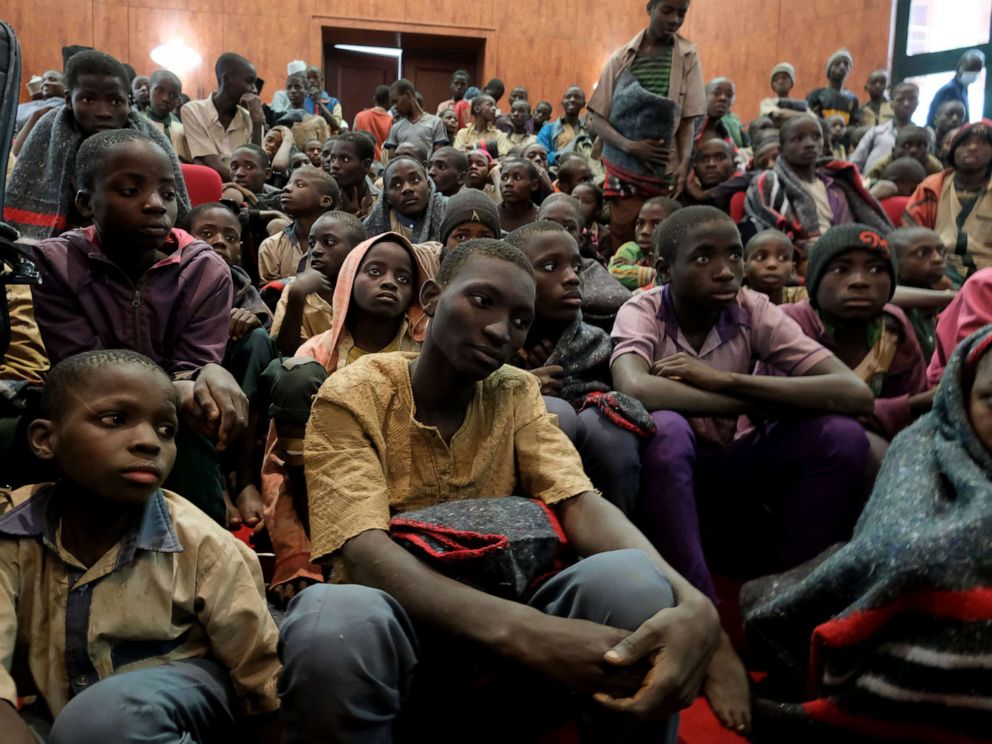 PHOTO: Released students sit together at the Government House with other students from the Government Science Secondary school, in Kankara, Katsina State, Nigeria, Dec. 18, 2020.