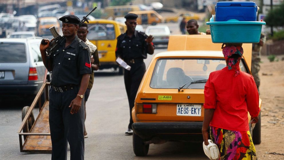 PHOTO: Nigerian police officers search vehicles on a busy road in Lagos in this undated stock photo.
