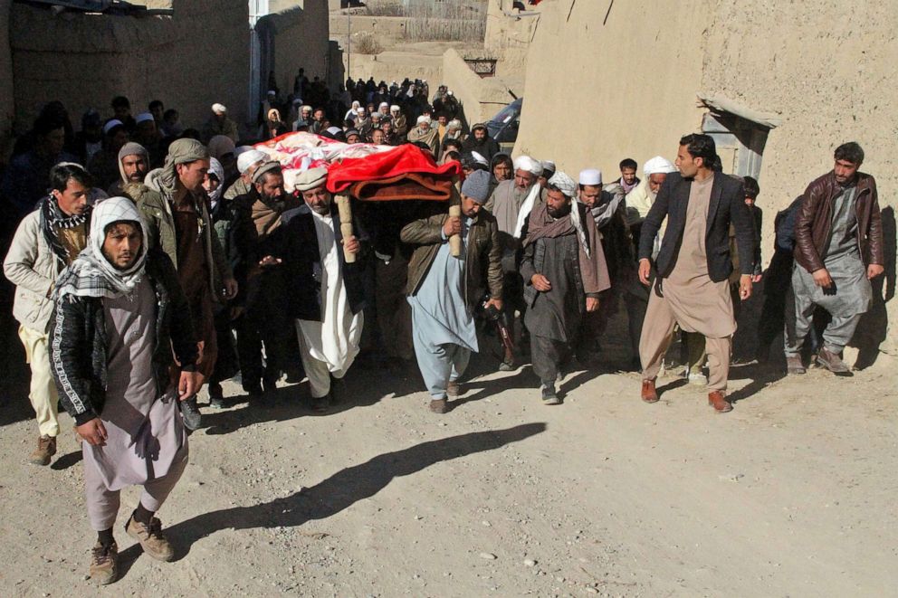 PHOTO: Family members and relatives take part in the funeral procession of Afghan journalist Rahmatullah Nekzad at Khoja Omari in Ghazni, Afghanistan, Dec. 22, 2020.