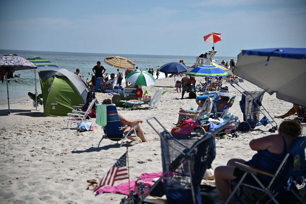 PHOTO: Beachgoers enjoy the weather at Island Beach State Park in Berkeley Township, N.J., on July 27, 2020.