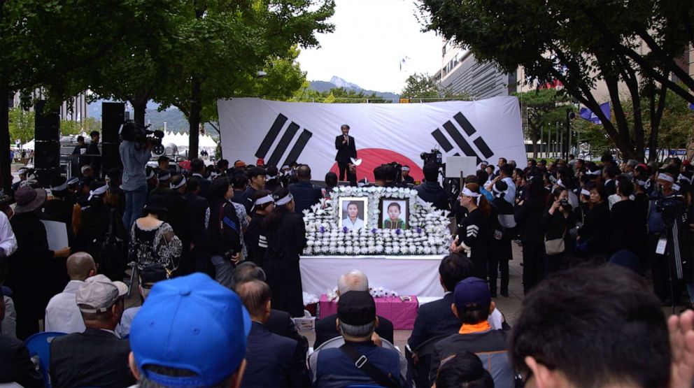 PHOTO: People attend a funeral service in Seoul, South Korea, Sept. 21, 2019, for a 42-year-old defector mother and her 6-year-old son, who were found dead of starvation.