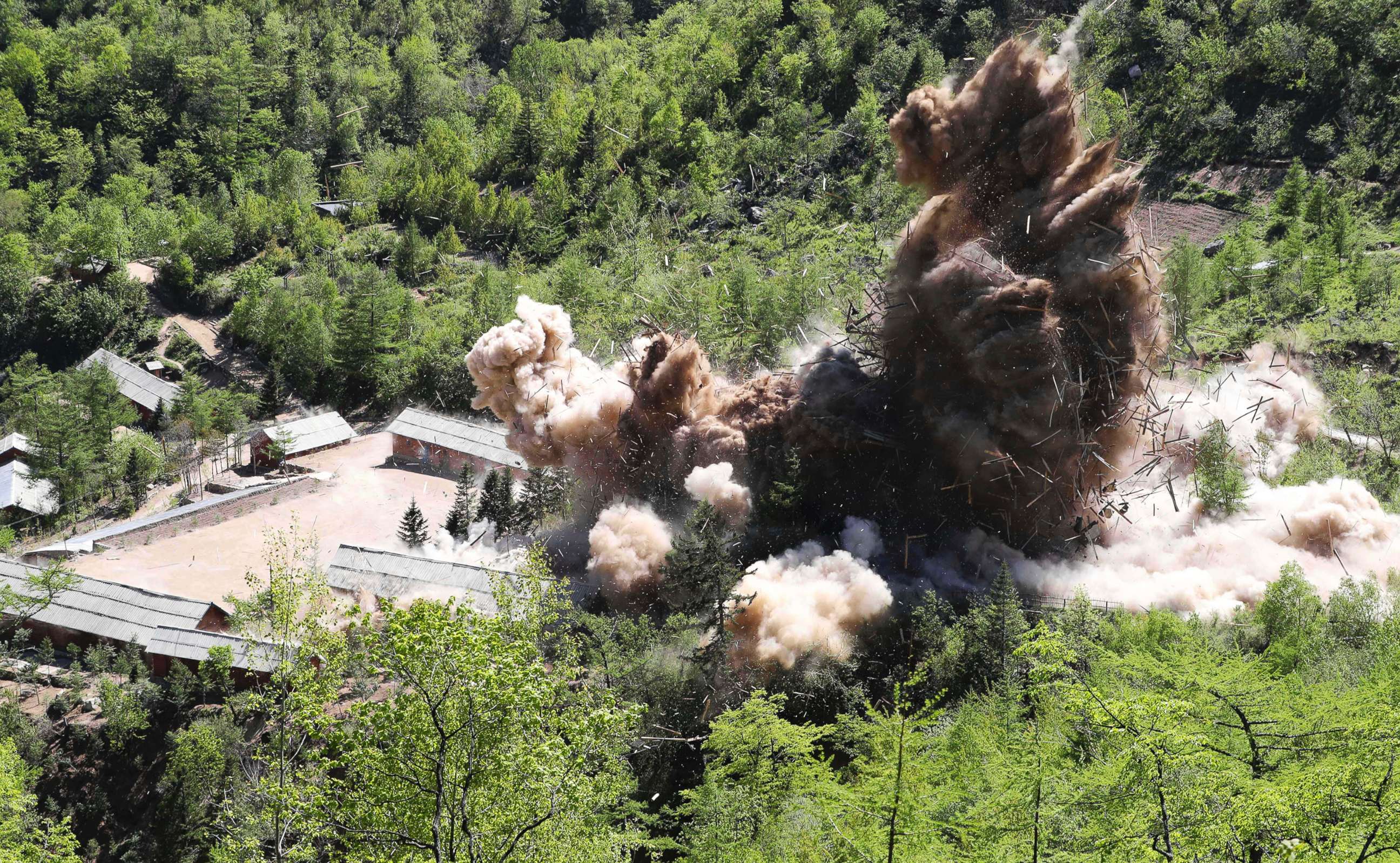 PHOTO: A command post facilities of North Korea's nuclear test site are blown up in Punggye-ri, North Korea, May 24, 2018.