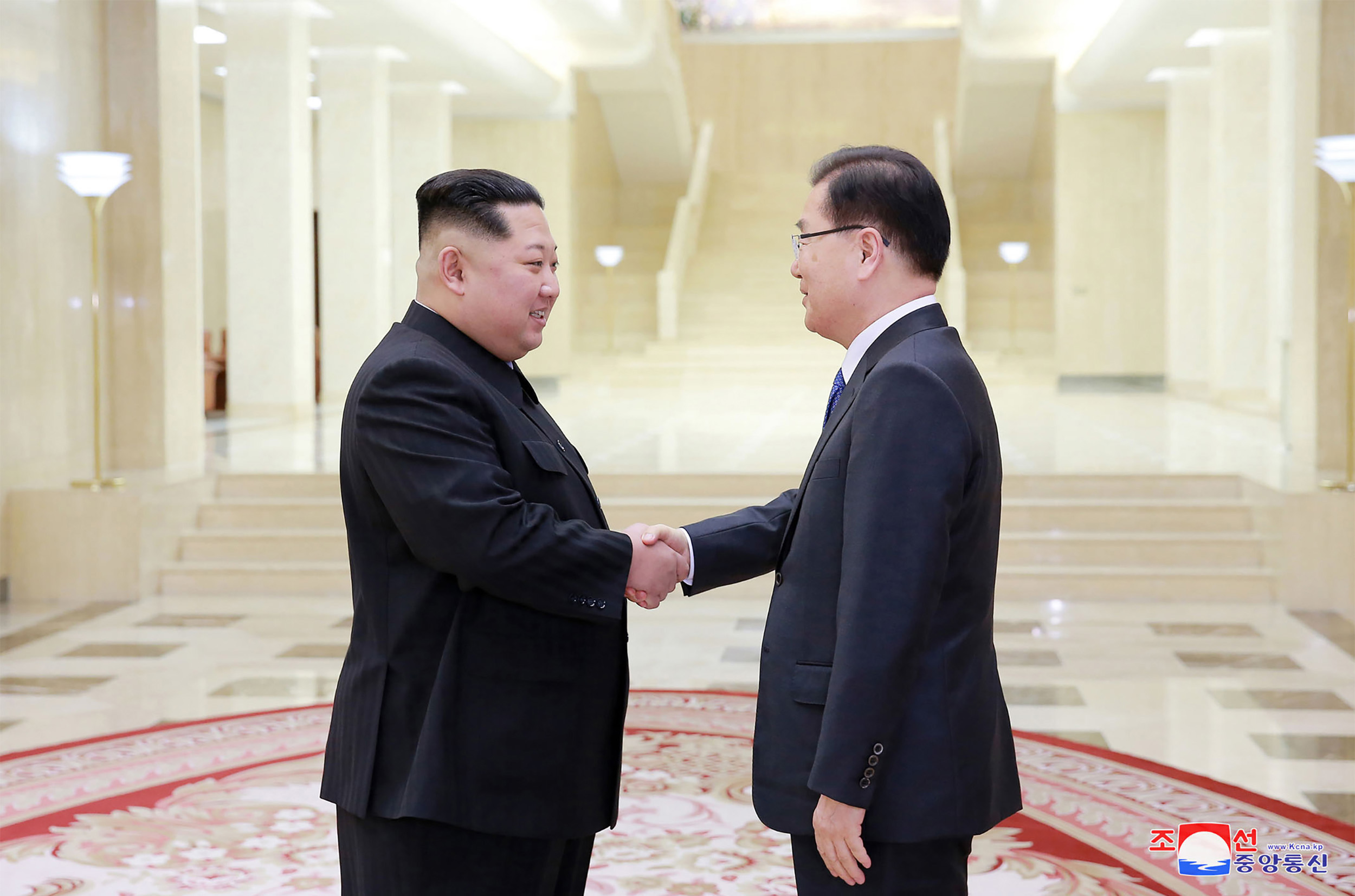 PHOTO: North Korean leader Kim Jong-Un shakes hands with South Korean chief delegator Chung Eui-yong ,March 5, 2018, during their meeting in Pyongyang, North Korea.
