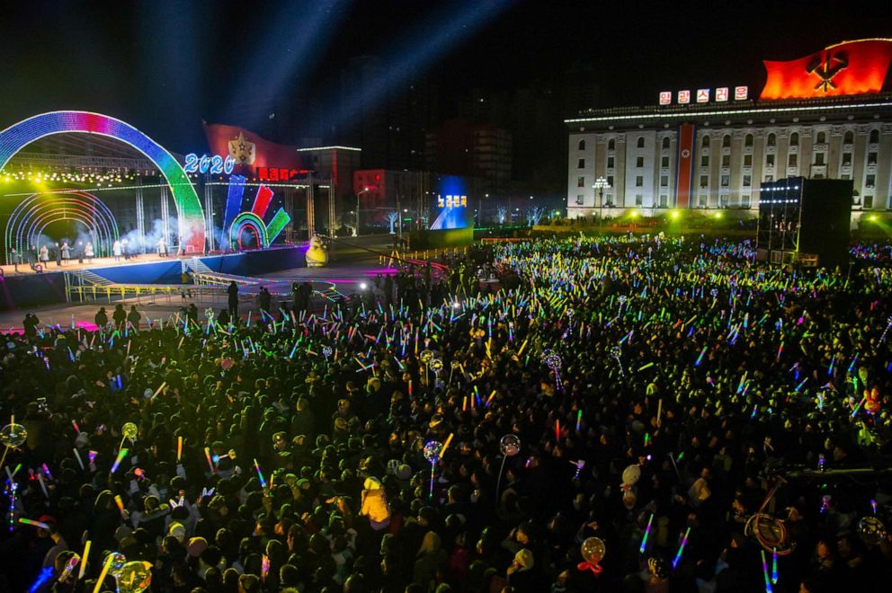PHOTO: Spectators watch a musical performance during an event marking the New Year on Kim Il Sung square in Pyongyang on December 31, 2019. 