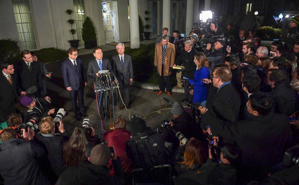 PHOTO: South Korean national security director Chung Eui-yong, center, speaks to reporters at the White House in Washington, March 8, 2018. Intelligence chief Suh Hoon is at left. 