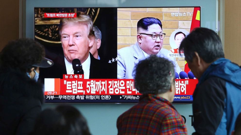 PHOTO: People watch a TV screen showing North Korean leader Kim Jong Un and President Donald Trump, left, at the Seoul Railway Station in Seoul, South Korea,  March 9, 2018. Trump has accepted an invitation from the North Korean leader to meet by May. 