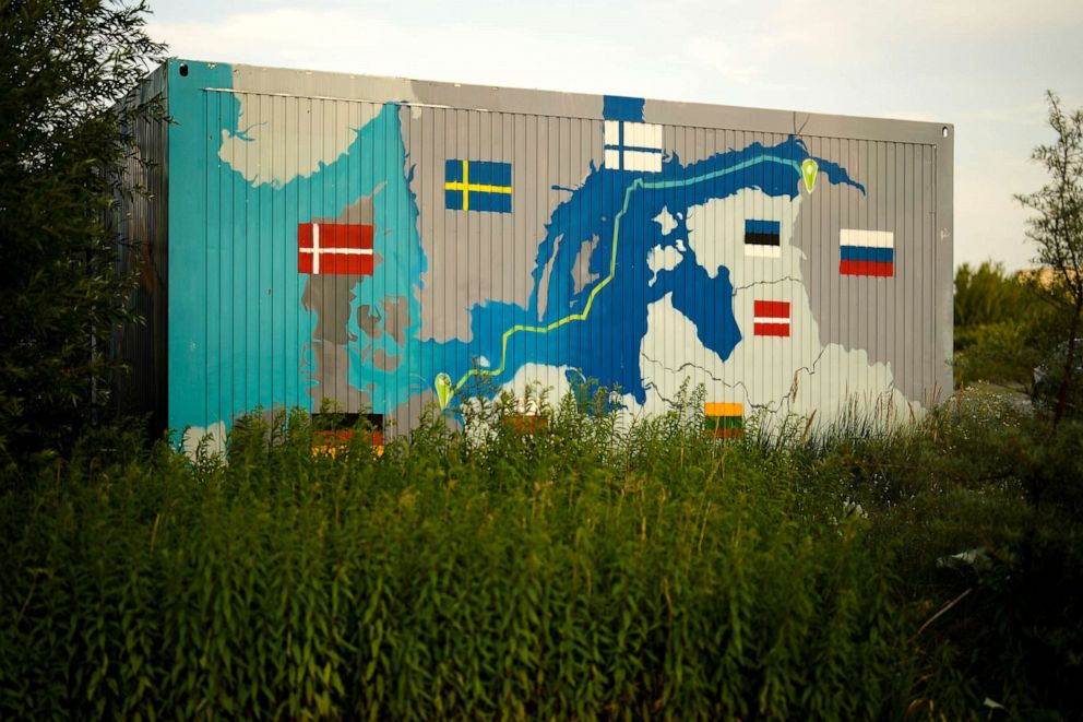 PHOTO: A painting showing the Nord Stream pipelines is displayed on a container near the Nord Stream 1 Baltic Sea pipeline in Lubmin, Germany, July 20, 2022.