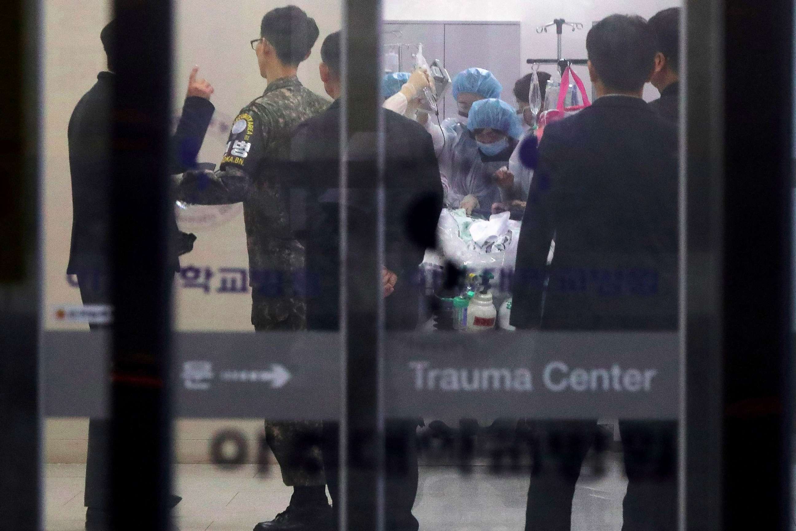 PHOTO: A South Korean military officer looks on as medical members treat an unidentified injured person, believed to be a North Korean soldier who defected, at a hospital in Suwon, South Korea, Nov. 13, 2017.