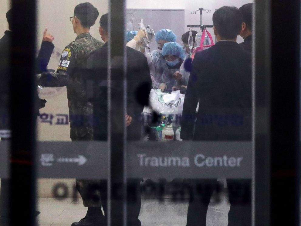 PHOTO: A South Korean military officer looks on as medical members treat an unidentified injured person, believed to be a North Korean soldier who defected, at a hospital in Suwon, South Korea, Nov. 13, 2017.