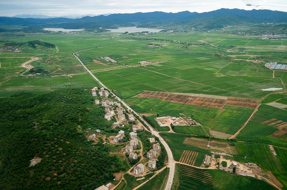 PHOTO: North Korean landscape is visible from the window of the plane carrying U.S. Secretary of State Mike Pompeo as it arrives at Sunan International Airport in Pyongyang, North Korea, July 6, 2018.