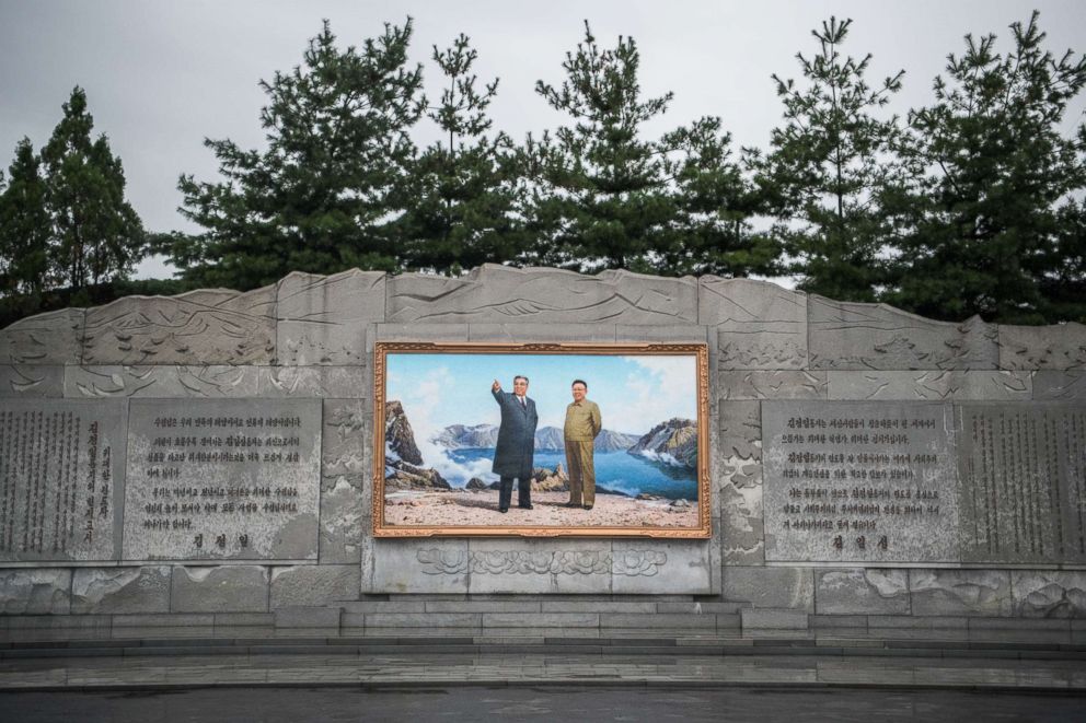 PHOTO: A picture of Kim Il-sung and Kim Jong-il is displayed at the entrance to Mansudae Art Studio on Aug. 23, 2018 in Pyongyang, North Korea.