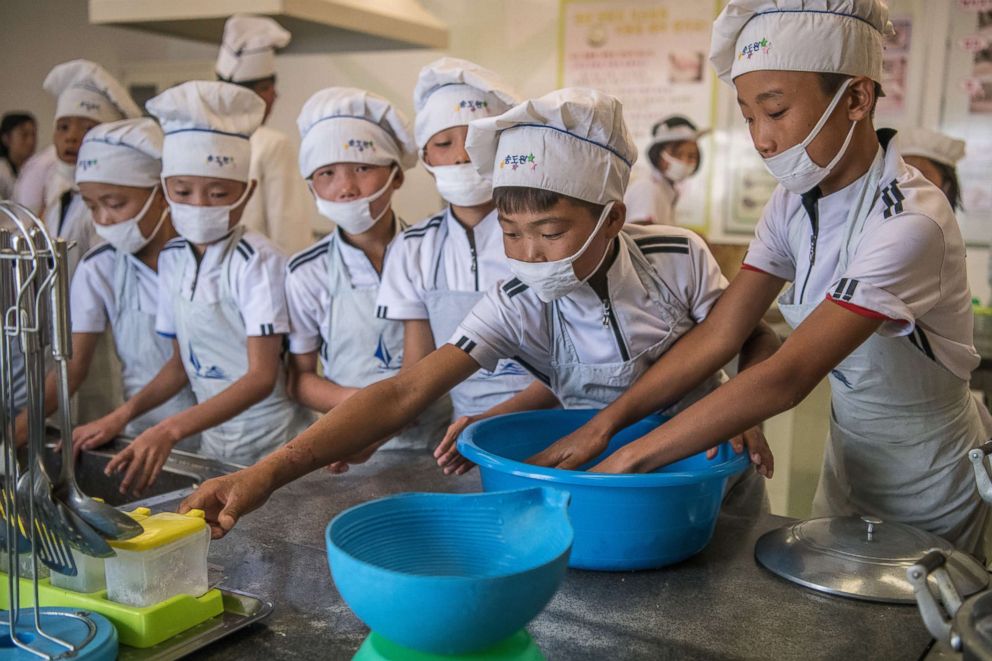 PHOTO: Children take part in a cookery lesson at Songdowon International School Children's Camp on Aug. 22, 2018 in Wonsan, North Korea. 