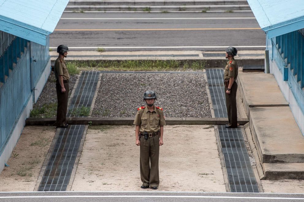 PHOTO: North Korean soldiers stand guard on the North Korean side of the Joint Security Area in the Demilitarised Zone (DMZ) on Aug. 24, 2018 in Kaesong, North Korea. 