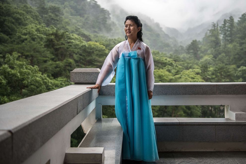 PHOTO: A guide poses for a photograph on the balcony of the International Friendship Exhibition centre on Aug. 20, 2018 in Myohyang, North Korea. 