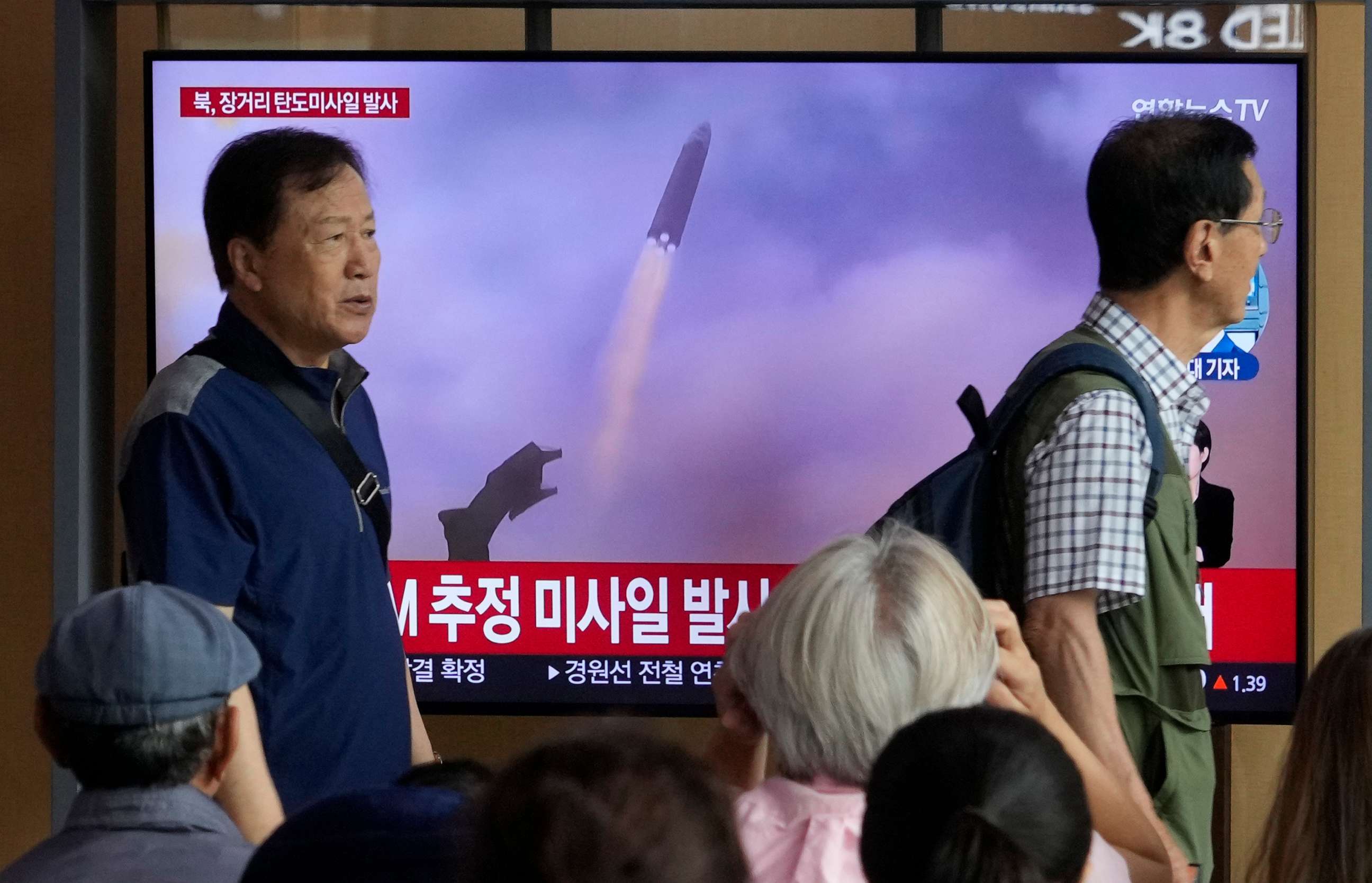 PHOTO: A TV screen shows a file image of North Korea's missile launch during a news program at the Seoul Railway Station in Seoul, South Korea, Wednesday, July 12, 2023.