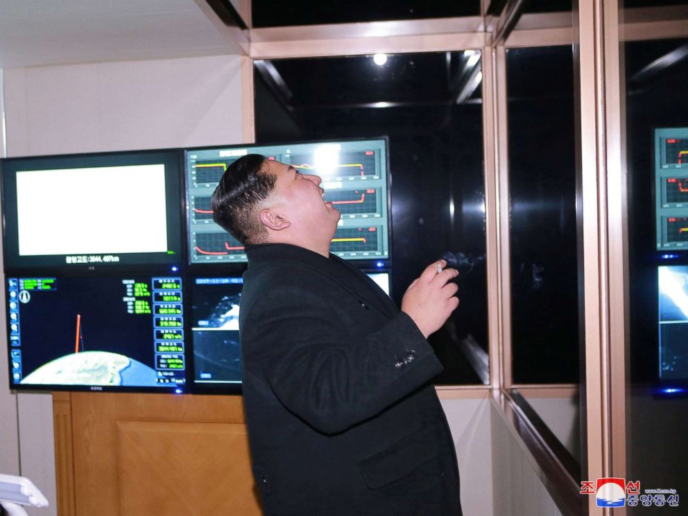 PHOTO: North Koreas leader Kim Jong Un is seen peering through a window in a photo released by North Koreas Korean Central News Agency on Nov. 30, 2017 after the successful test launch of a Hwasong-15 intercontinental ballistic rocket.
