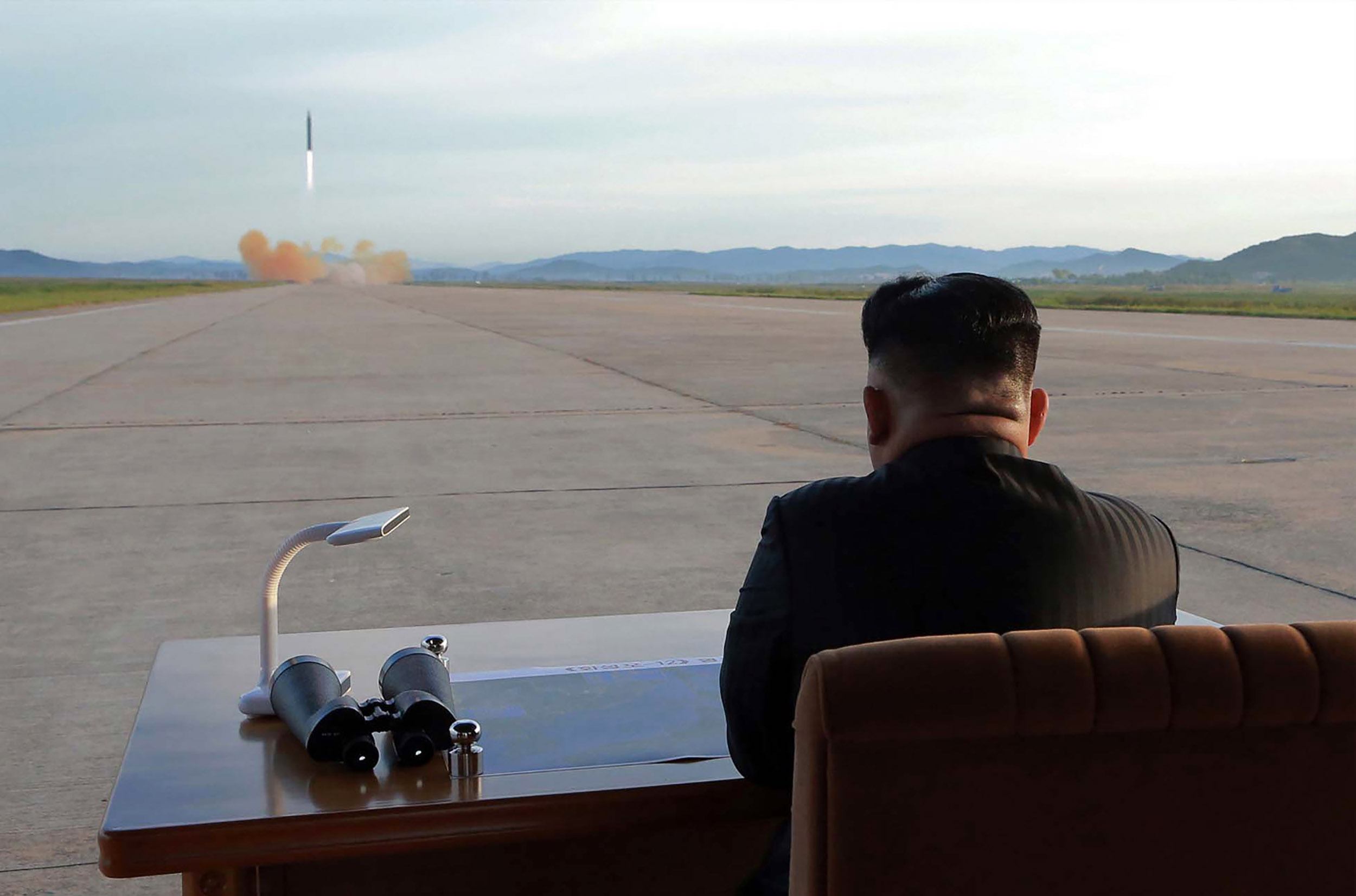 PHOTO: North Korean leader Kim Jong Un watches a launching drill of the medium-and-long range strategic ballistic rocket Hwasong-12 at an undisclosed location, in a photo released on Sept. 16, 2017 by the Korean Central News Agency.