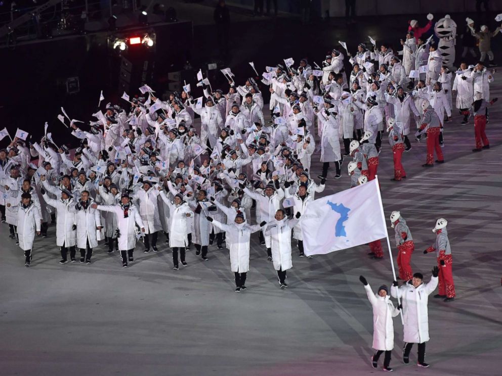 PHOTO: Unified Koreas flag-bearers, North Korean Hwang Chung Gum and South Korean Won Yun-jong, lead the Unified Koreas delegation as they parade during the opening ceremony of the Pyeongchang 2018 Winter Olympic Games on Feb. 9, 2018.