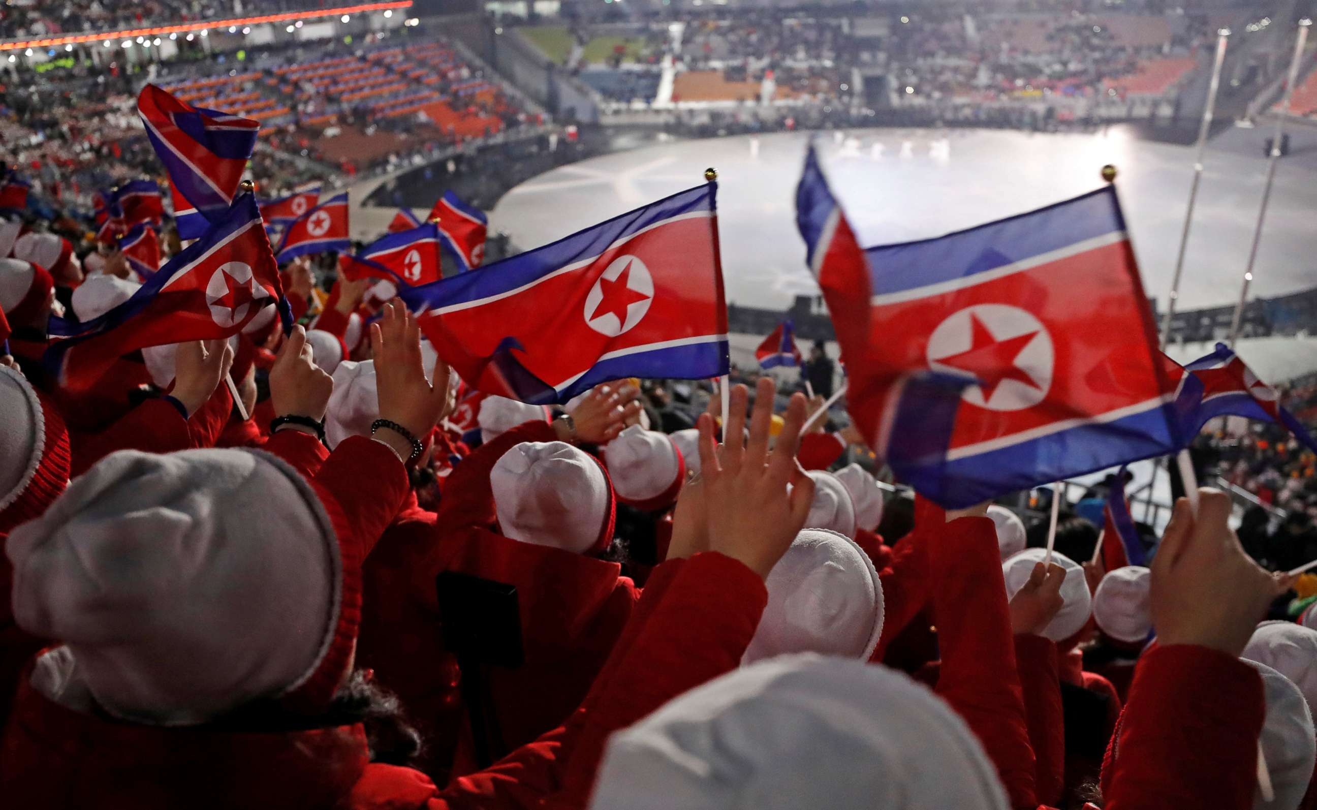PHOTO: Members of the North Korean cheerleading team wave flags before the start of the Opening Ceremony of the Pyeongchang 2018 Winter Olympics, Feb. 9, 2018.