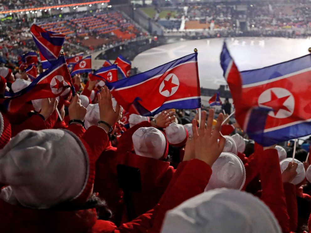 PHOTO: Members of the North Korean cheerleading team wave flags before the start of the Opening Ceremony of the Pyeongchang 2018 Winter Olympics, Feb. 9, 2018.